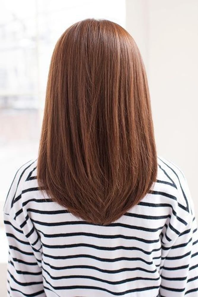 Coupe U-Shape sur cheveux longs épais et lisses vue de dos